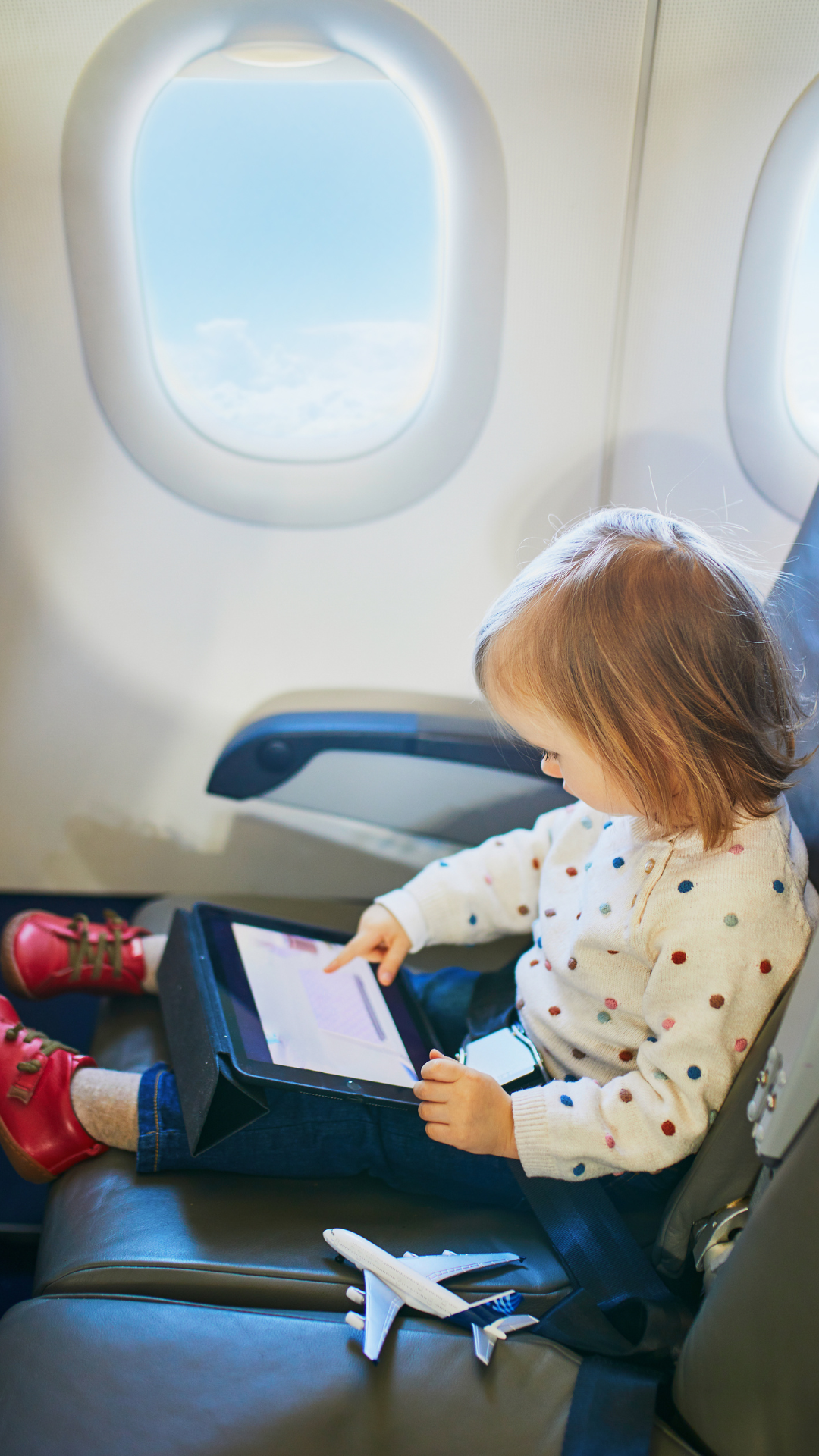 child on plane travel gift